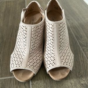 Beige cork wedge heel; worn a few times; size 8; small scuff on back right shoe